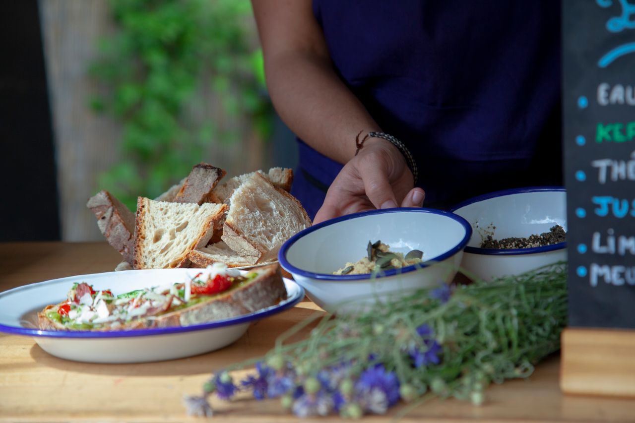 contact-img A close-up of a healthy homemade meal on a wooden table. Fresh ingredients and vibrant colors.