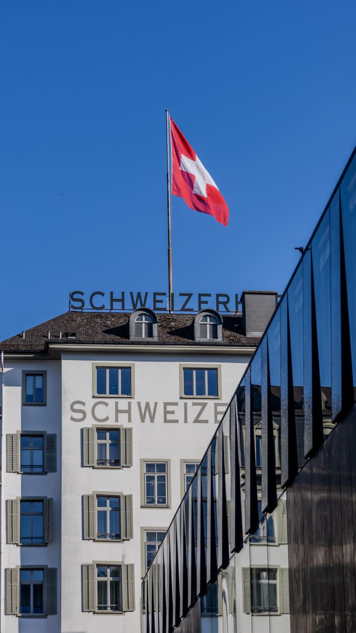 our-experience Modern and classic Swiss architecture under a clear sky in Lucerne, Switzerland.